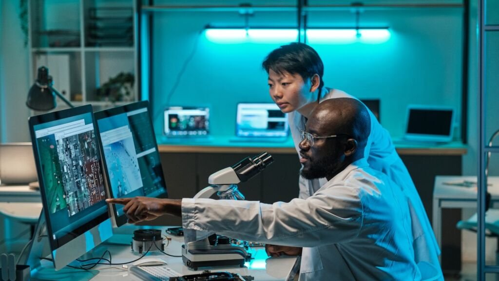 Cross Biologics research team analyzing biologic data and laboratory results on digital workstations